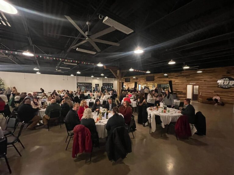 Crowd at Chamber meeting event.